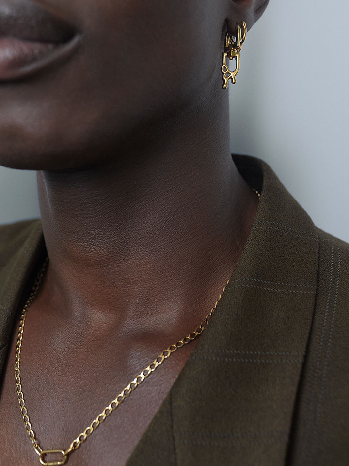 Sortedam Huggie Goldplated Silver